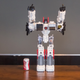 Illustration for article titled The Biggest Transformer Ever, Standing Next to Stuff